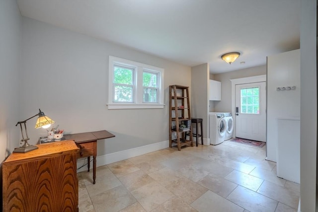 7 Argyle St, Worcester, MA 01609 - washroom featuring cabinet space, washing machine and clothes dryer, and baseboards
