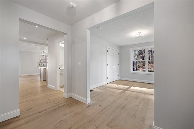 hallway featuring light wood-type flooring