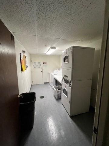 laundry room with stacked washer and dryer