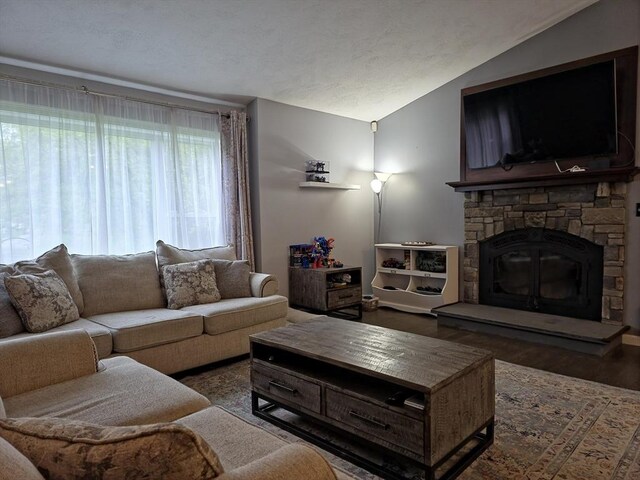 357 Ledge Rd, Seekonk, MA 02771 - living room featuring a fireplace, lofted ceiling, and wood finished floors