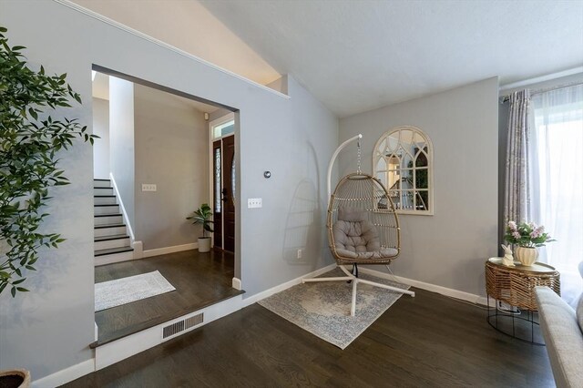 357 Ledge Rd, Seekonk, MA 02771 - foyer entrance with stairs, wood finished floors, visible vents, vaulted ceiling, and baseboards