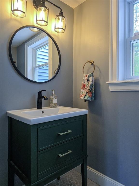 357 Ledge Rd, Seekonk, MA 02771 - bathroom featuring baseboards and vanity