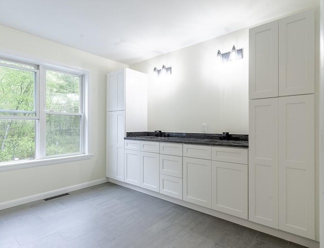 357 Ledge Rd, Seekonk, MA 02771 - full bathroom with baseboards, visible vents, a sink, and double vanity