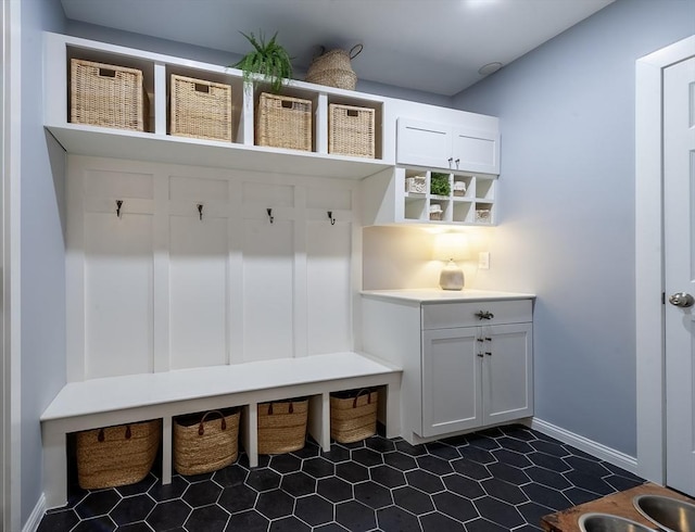 357 Ledge Rd, Seekonk, MA 02771 - mudroom featuring dark tile patterned flooring and baseboards