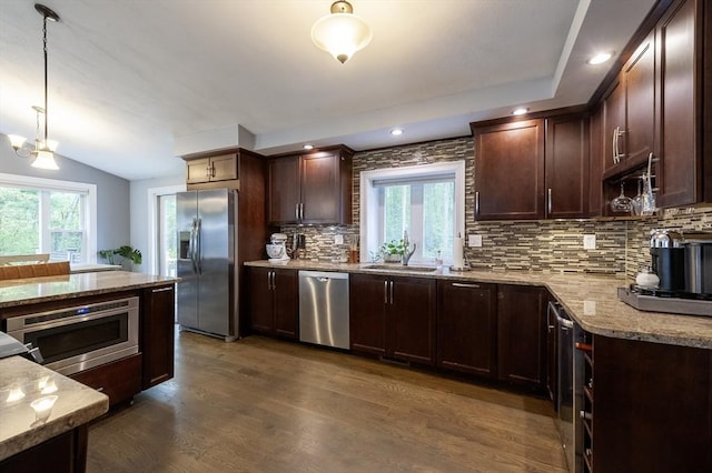 357 Ledge Rd, Seekonk, MA 02771 - kitchen featuring light stone countertops, dark brown cabinetry, a sink, backsplash, and stainless steel appliances