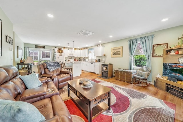 12 Cliff St, Worcester, MA 01607 - living room with plenty of natural light, light wood-style flooring, and recessed lighting