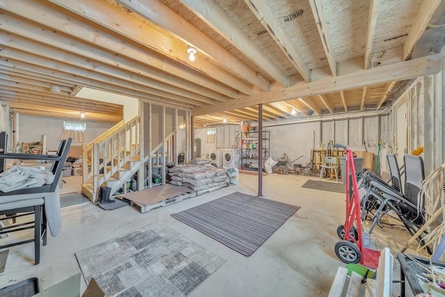 12 Cliff St, Worcester, MA 01607 - unfinished below grade area featuring washer and clothes dryer and stairway