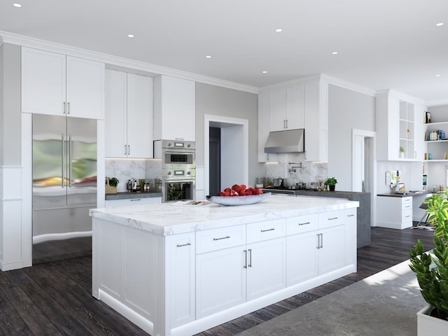 kitchen featuring dark hardwood / wood-style floors, stainless steel appliances, tasteful backsplash, and white cabinetry