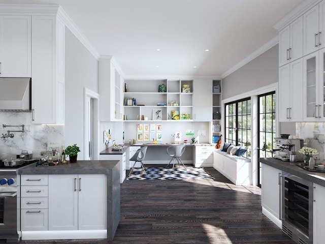 kitchen featuring beverage cooler, wall oven, white cabinets, backsplash, and dark hardwood / wood-style floors