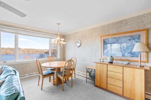 dining area with a water view, baseboard heating, and ornamental molding