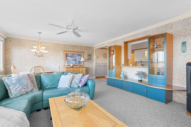 living area featuring carpet floors, crown molding, and wallpapered walls