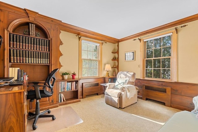 carpeted home office featuring ornamental molding