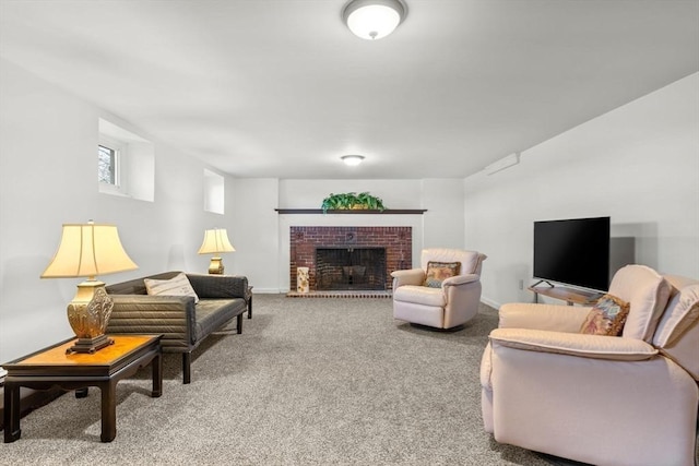 living room featuring baseboards, a brick fireplace, and carpet flooring