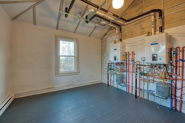 interior space featuring water heater, dark hardwood / wood-style flooring, vaulted ceiling, and a baseboard heating unit