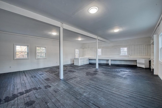 basement with dark wood-type flooring