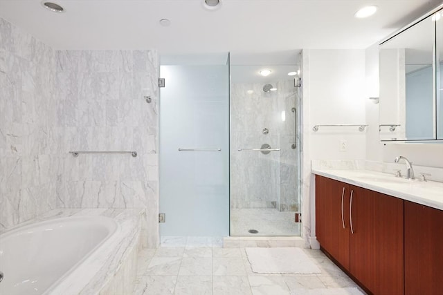 bathroom featuring vanity and plus walk in shower