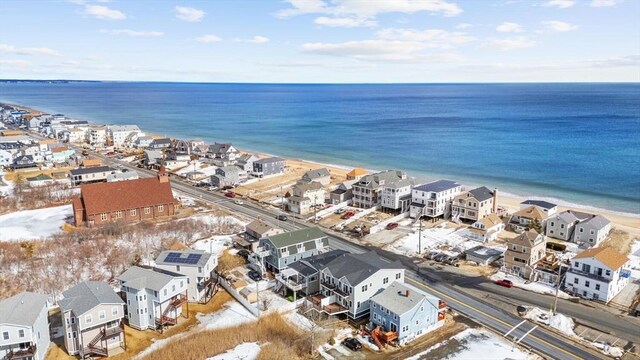 birds eye view of property with a residential view and a water view