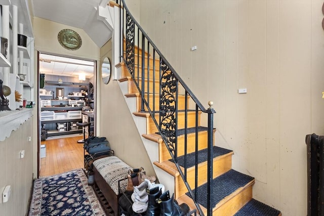 8 Peaceable St, Boston, MA 02135 - staircase featuring hardwood / wood-style flooring and lofted ceiling