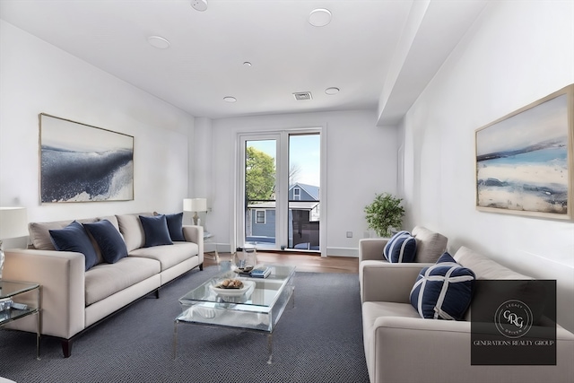 living room featuring dark hardwood / wood-style floors