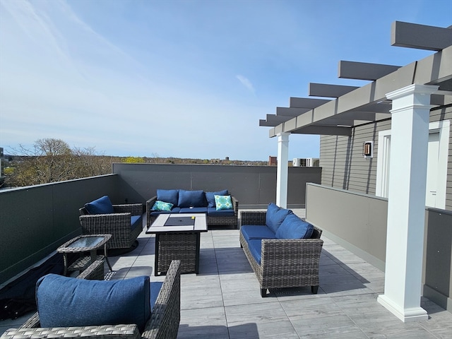 view of patio / terrace with an outdoor living space and a pergola