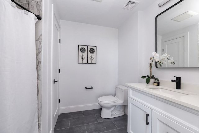 bathroom featuring vanity, tile patterned flooring, toilet, and curtained shower