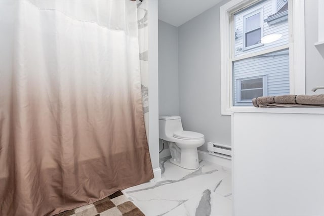 bathroom with toilet and a baseboard heating unit