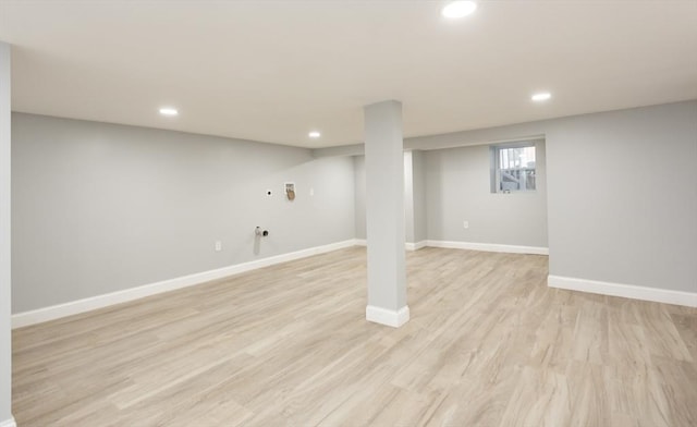 basement featuring light hardwood / wood-style floors