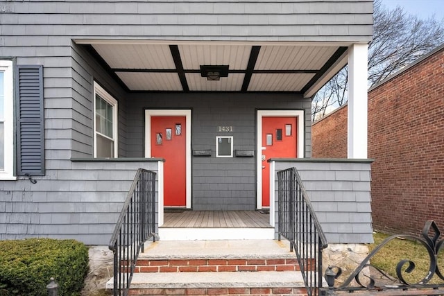 doorway to property with a porch