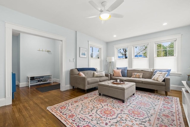 living area featuring dark wood finished floors, ceiling fan, baseboards, and recessed lighting