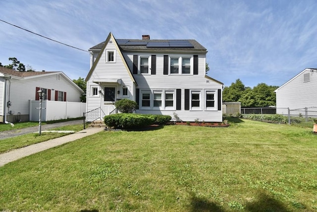 98 Osborne Ter, Springfield, MA 01104 - view of front of property featuring entry steps, a chimney, and solar panels