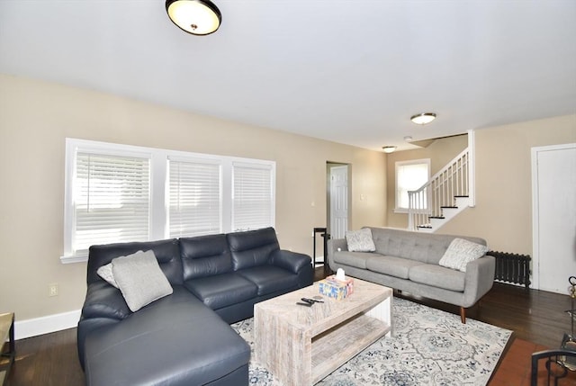 98 Osborne Ter, Springfield, MA 01104 - living room featuring stairway, dark wood finished floors, and baseboards