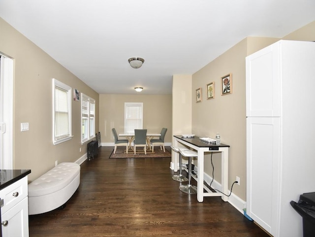 98 Osborne Ter, Springfield, MA 01104 - dining room with dark wood-style floors and baseboards