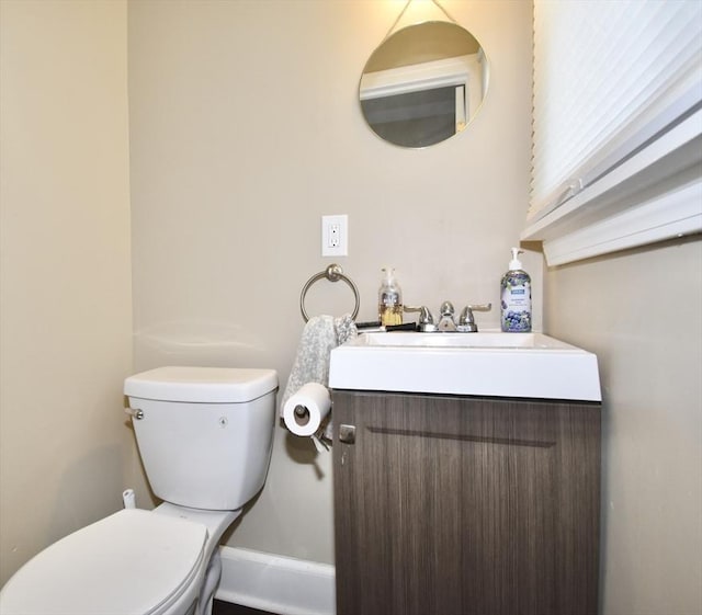 98 Osborne Ter, Springfield, MA 01104 - half bathroom featuring toilet and vanity