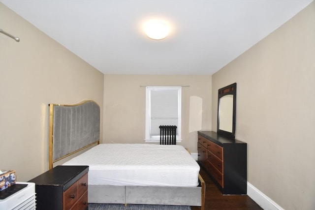 98 Osborne Ter, Springfield, MA 01104 - bedroom featuring dark wood-type flooring and baseboards