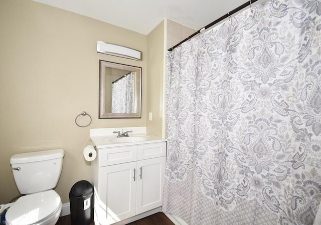 98 Osborne Ter, Springfield, MA 01104 - full bathroom with vanity, toilet, and curtained shower