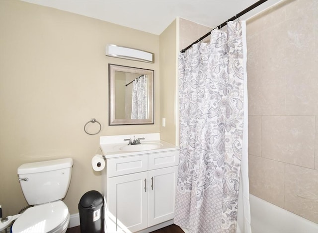 98 Osborne Ter, Springfield, MA 01104 - bathroom featuring vanity, toilet, and shower / bath combo with shower curtain
