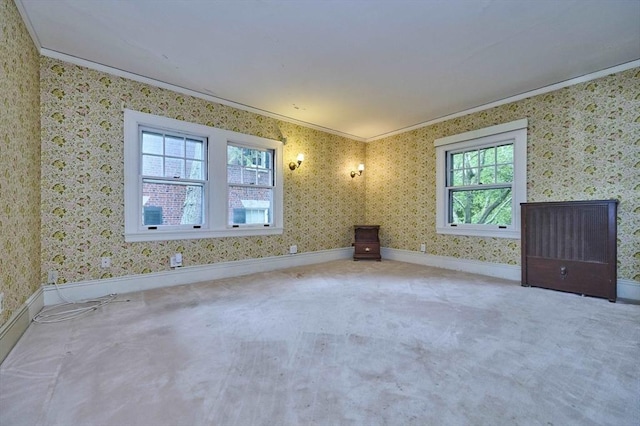 92 Dean Rd, Brookline, MA 02445 - carpeted empty room with crown molding, baseboards, and wallpapered walls