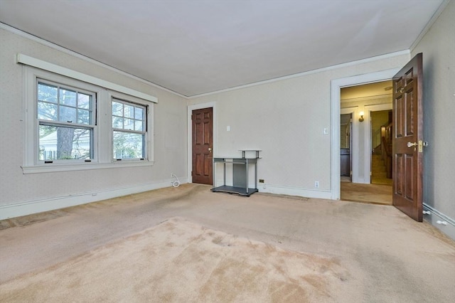 92 Dean Rd, Brookline, MA 02445 - carpeted empty room with ornamental molding and baseboards