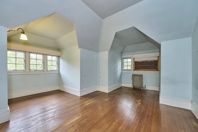 92 Dean Rd, Brookline, MA 02445 - additional living space featuring radiator, hardwood / wood-style floors, lofted ceiling, and baseboards
