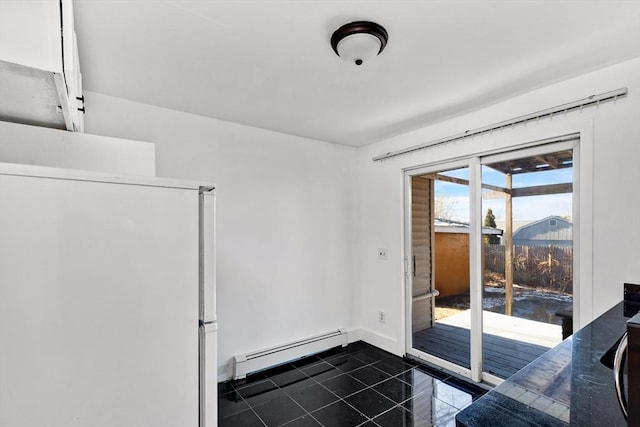 doorway featuring a mountain view and a baseboard heating unit