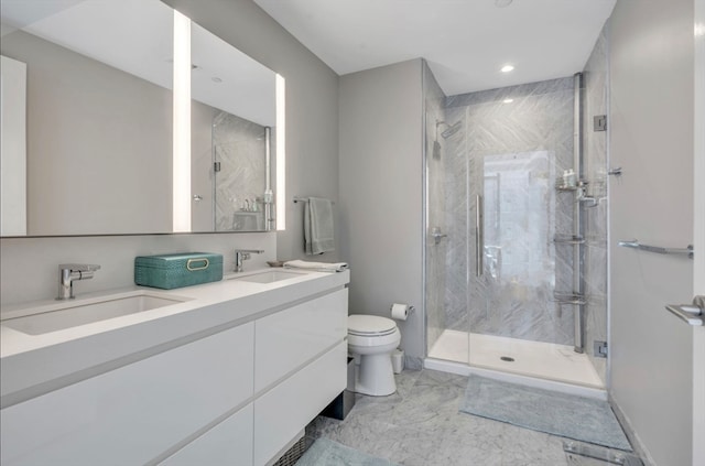 bathroom with a shower with shower door, tile patterned floors, double sink vanity, and toilet