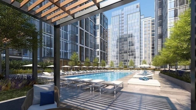 view of swimming pool featuring a pergola and a patio