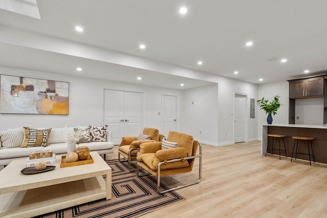 57 Mayflower Rd, Needham, MA 02492 - living area featuring light wood-style floors, recessed lighting, and baseboards
