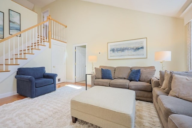 1 Washington Ct Unit 1, Uxbridge, MA 01569 - living area featuring stairs, wood finished floors, and baseboards