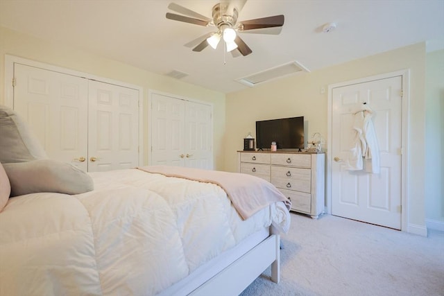 1 Washington Ct Unit 1, Uxbridge, MA 01569 - bedroom with attic access, multiple closets, light carpet, a ceiling fan, and baseboards