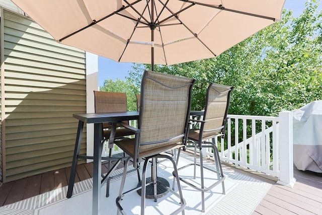 1 Washington Ct Unit 1, Uxbridge, MA 01569 - wooden terrace with outdoor dining area