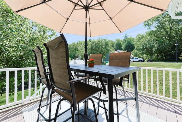 1 Washington Ct Unit 1, Uxbridge, MA 01569 - wooden terrace featuring outdoor dining space and a lawn