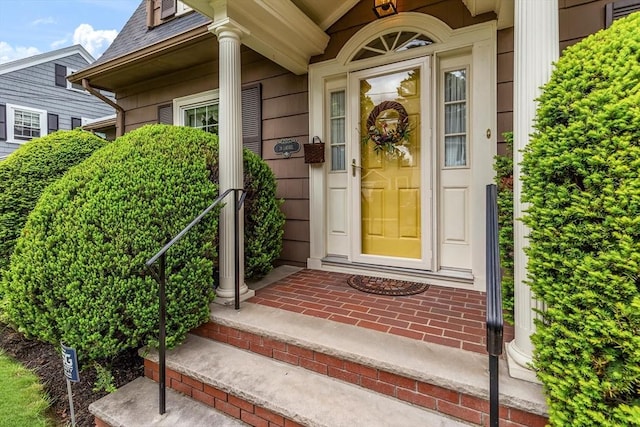 doorway to property featuring a porch