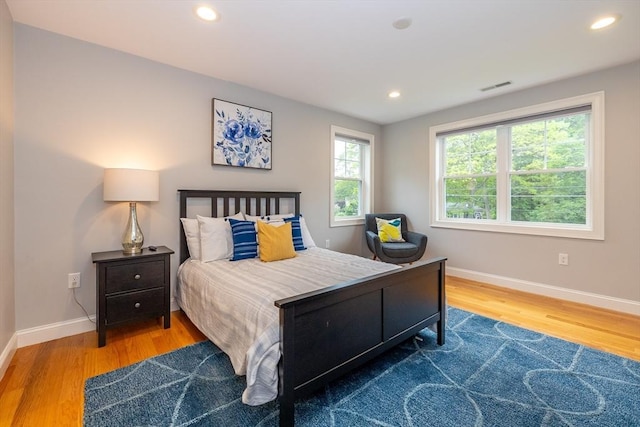 11 Liberty Ave, Burlington, MA 01803 - bedroom with wood finished floors, baseboards, and recessed lighting