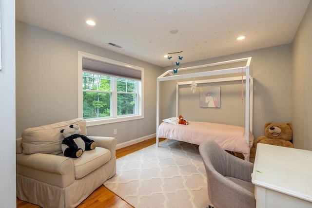 11 Liberty Ave, Burlington, MA 01803 - bedroom with wood finished floors, recessed lighting, and baseboards